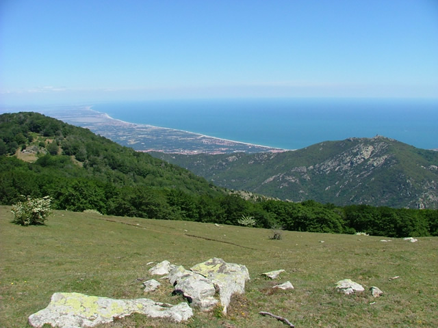 Looking down off the final ridges of the Pyrenees to the plain of Rousillon and Mediterranean sea.